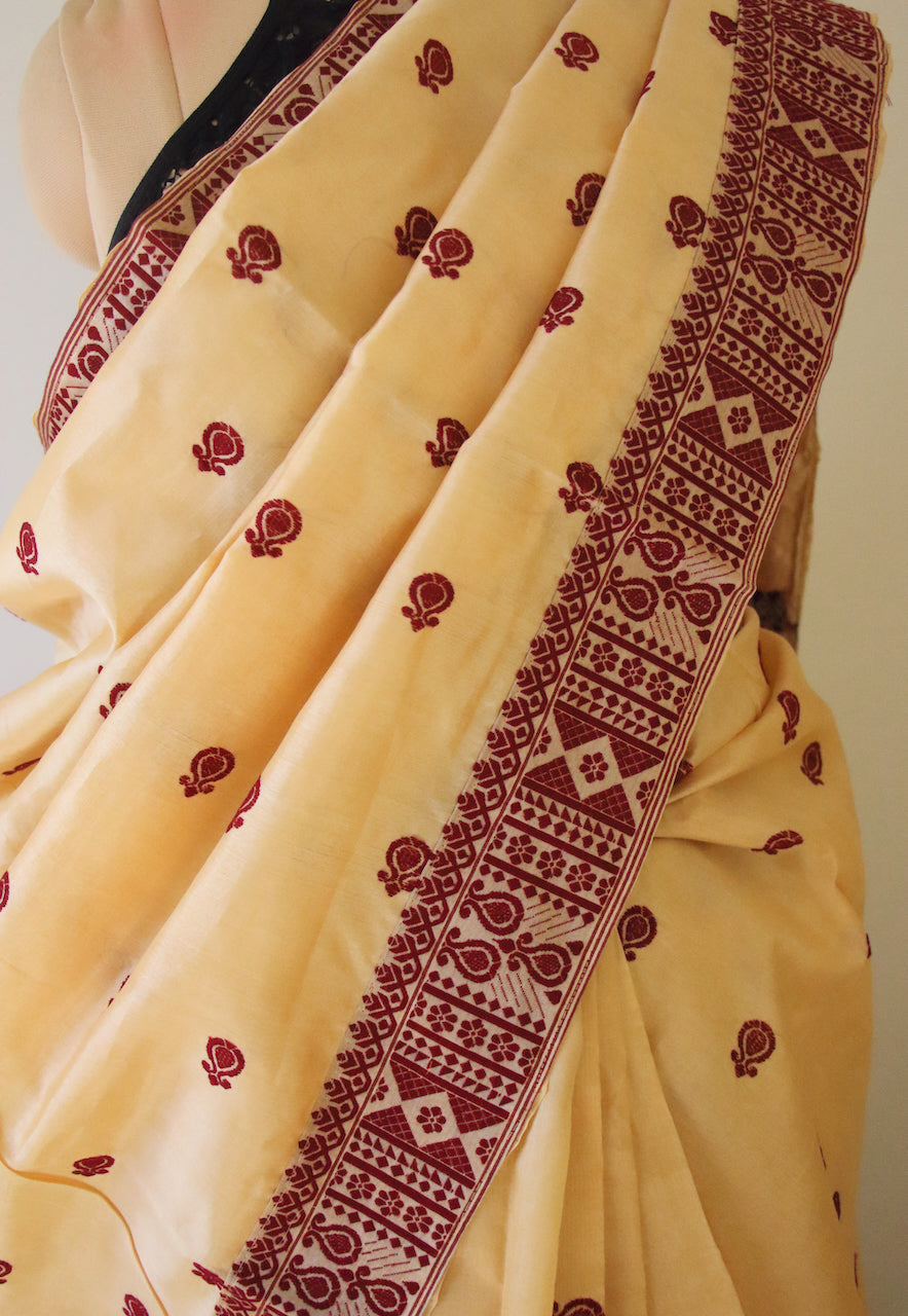 Handloom Tassar Silk Sari with traditional maroon motifs from Assam