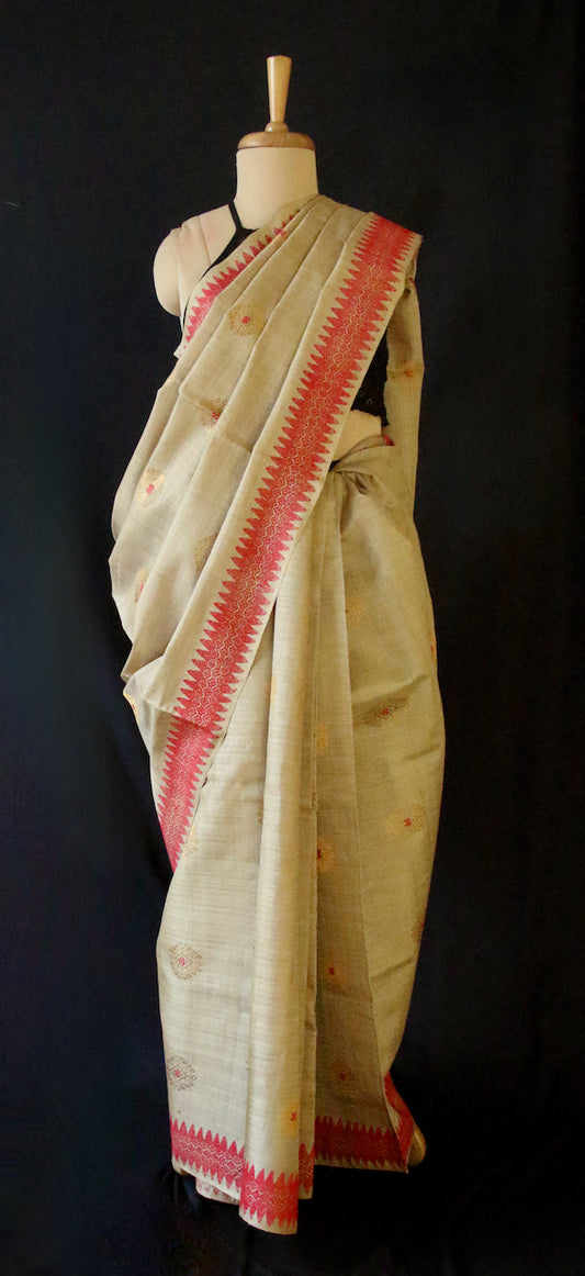 Muga Silk Sari with golden zari and Eri Silk motifs from Assam