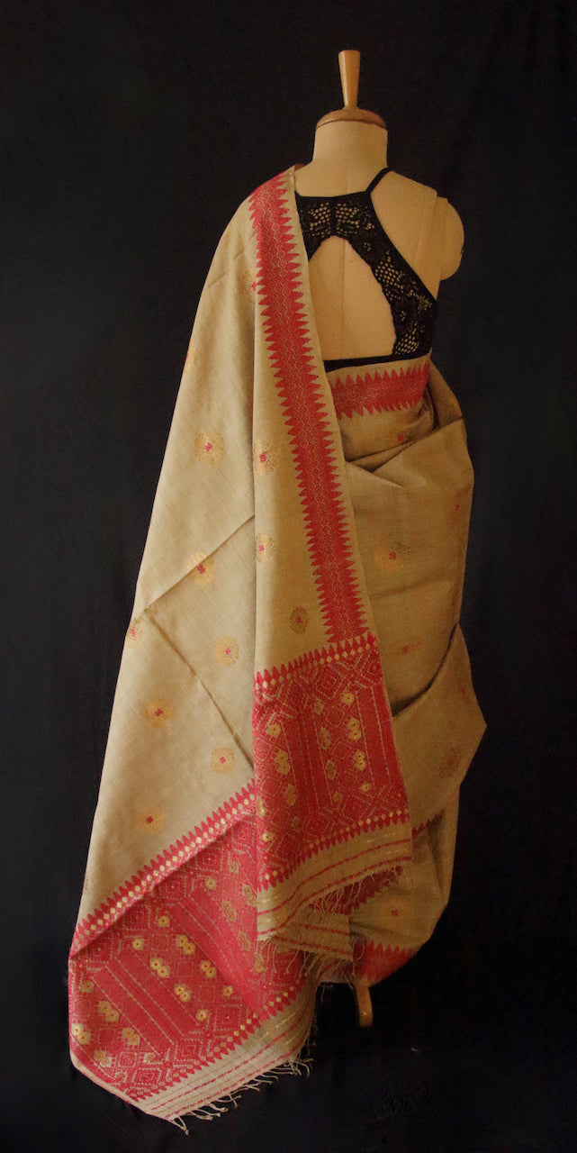 Muga Silk Sari with golden zari and Eri Silk motifs from Assam