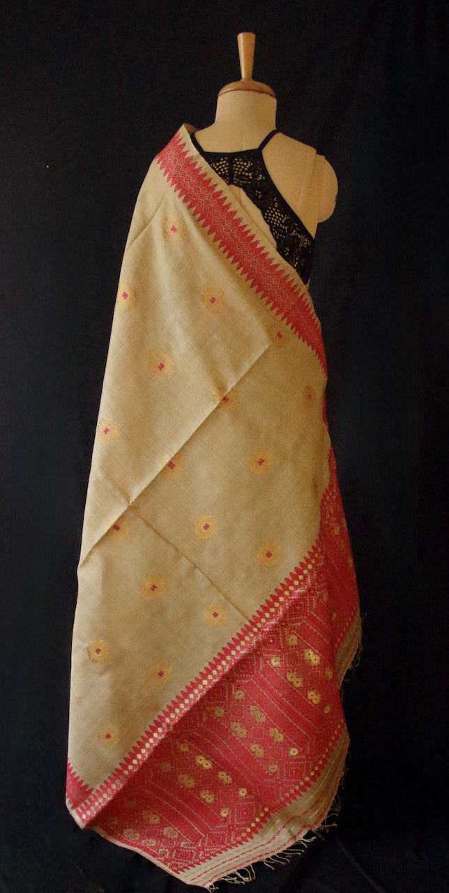 Muga Silk Sari with golden zari and Eri Silk motifs from Assam