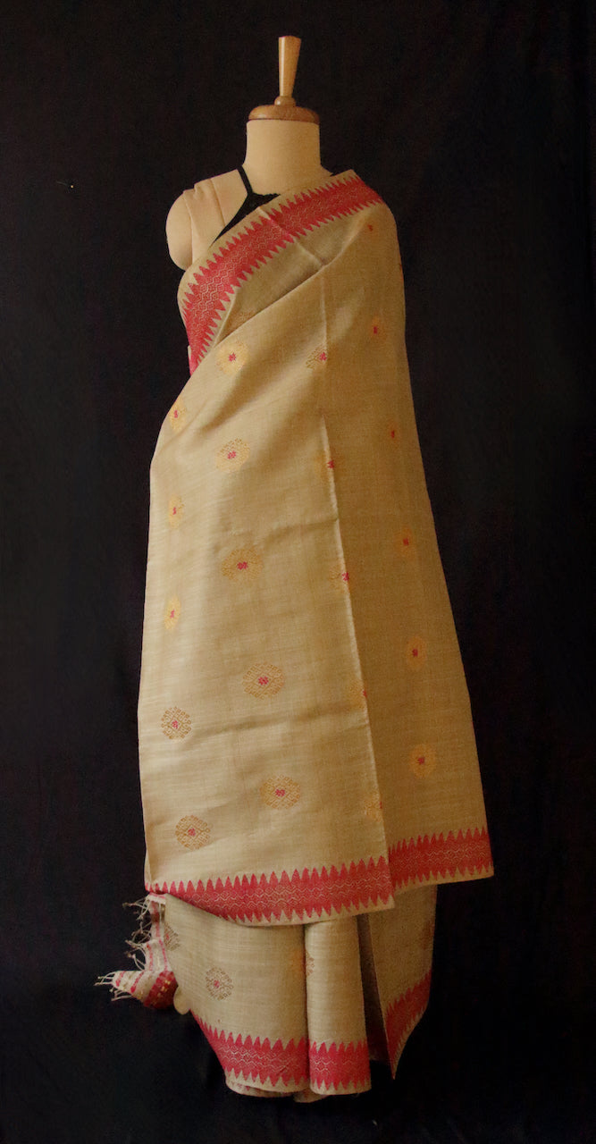 Muga Silk Sari with golden zari and Eri Silk motifs from Assam