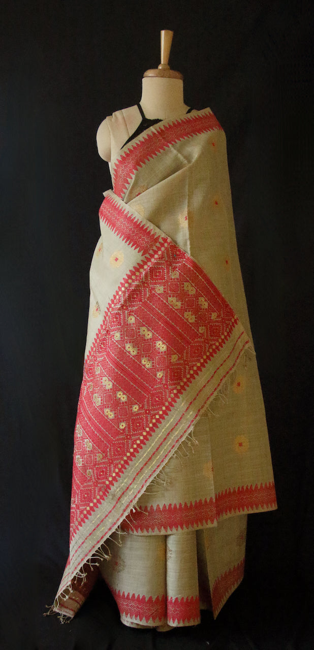 Muga Silk Sari with golden zari and Eri Silk motifs from Assam