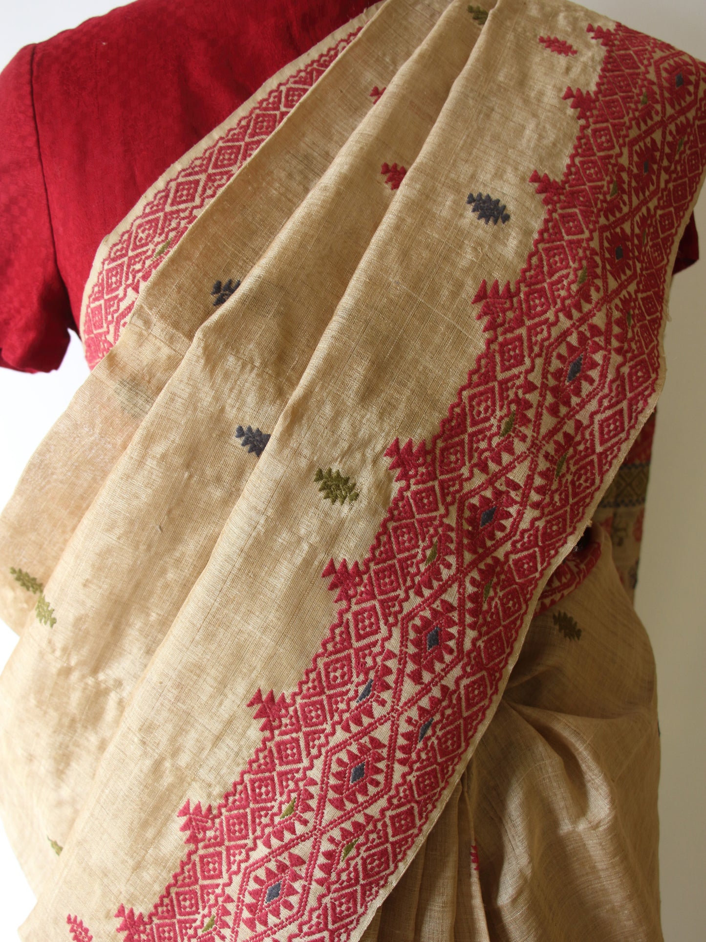 Muga Silk Saree with natural dyed Eri Silk motifs from Assam