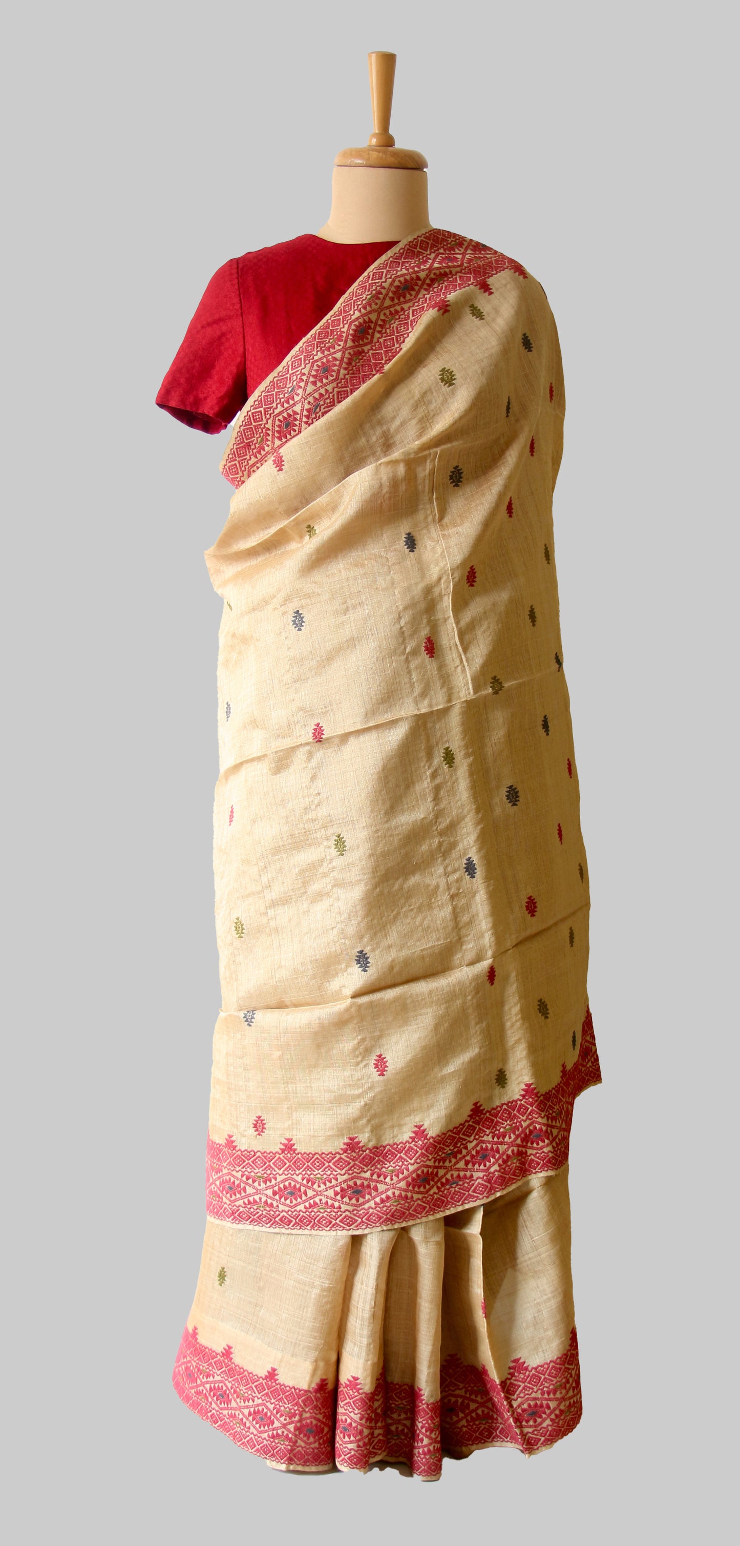 Muga Silk Saree with natural dyed Eri Silk motifs from Assam