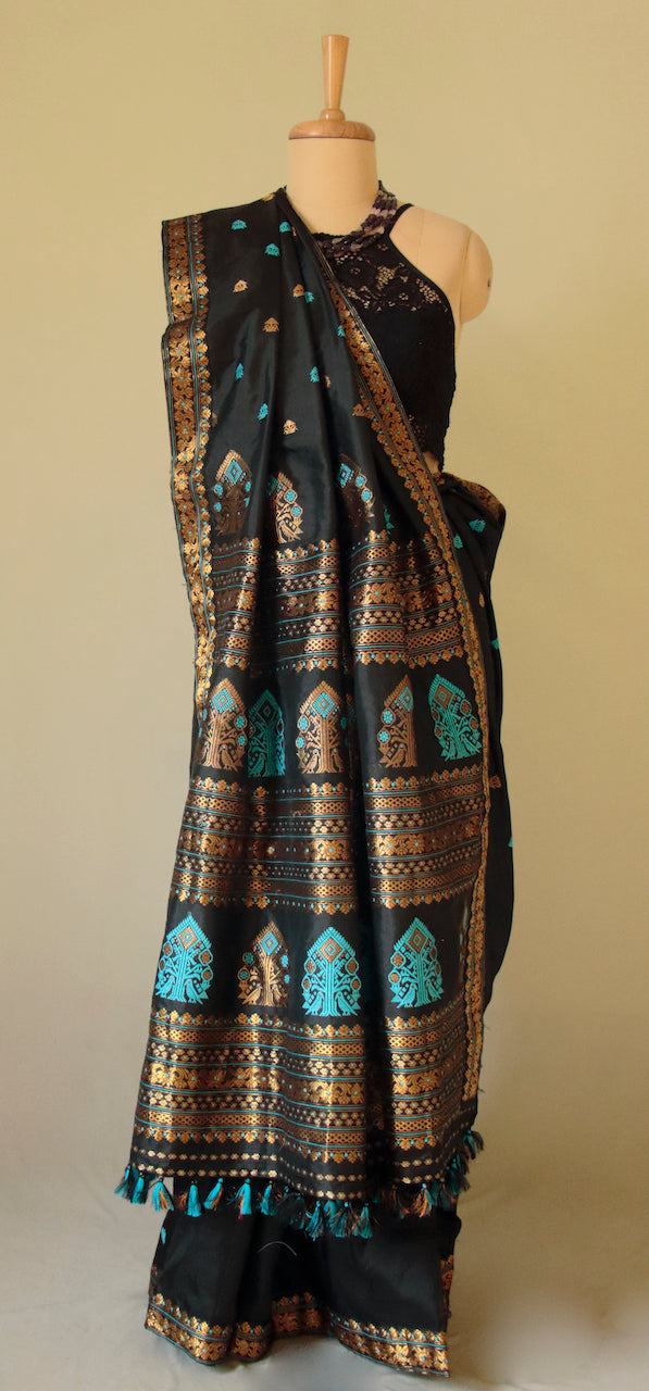 Black Handloom Mulberry Silk  Sari with golden zari motifs from Assam