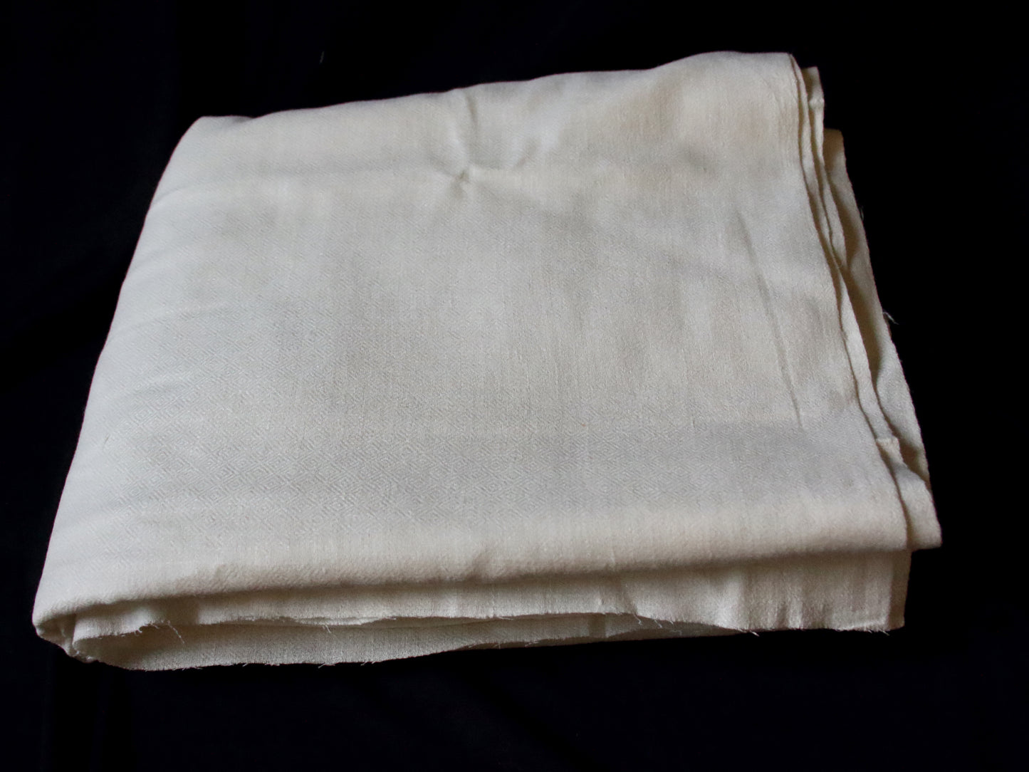 Handloom Eri Silk Fabric. - Diamond Patterned Self Design