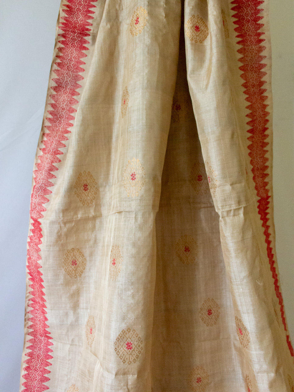 Muga Silk Sari with golden zari and Eri Silk motifs from Assam