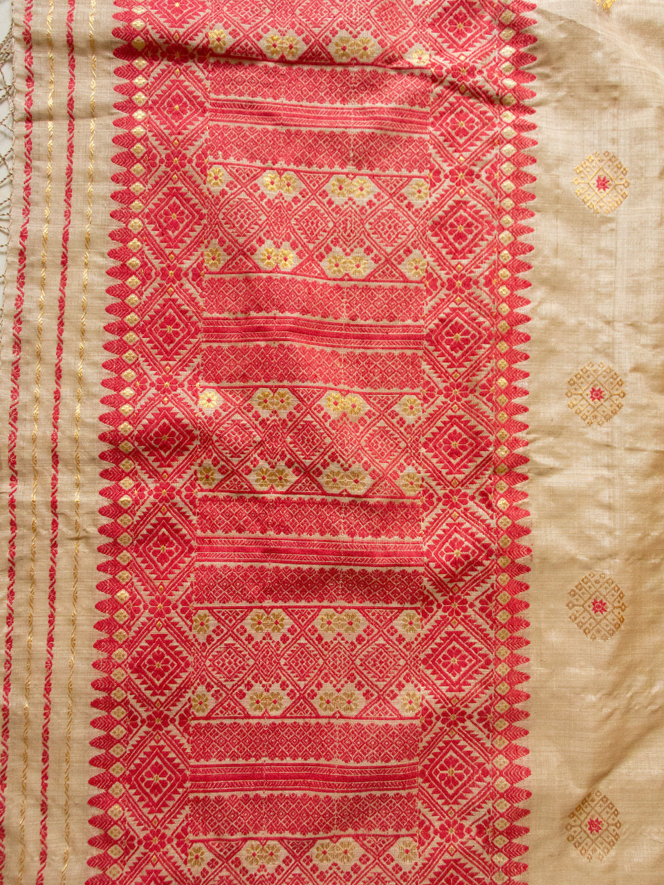 Muga Silk Sari with golden zari and Eri Silk motifs from Assam