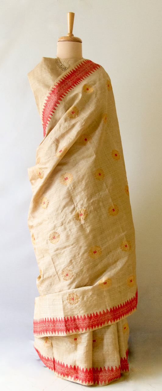 Muga Silk Sari with golden zari and Eri Silk motifs from Assam