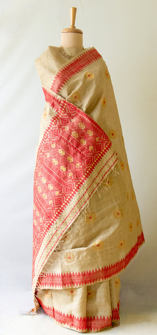 Muga Silk Sari with golden zari and Eri Silk motifs from Assam