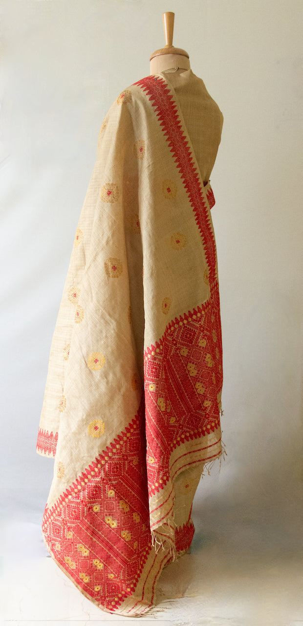 Muga Silk Sari with golden zari and Eri Silk motifs from Assam