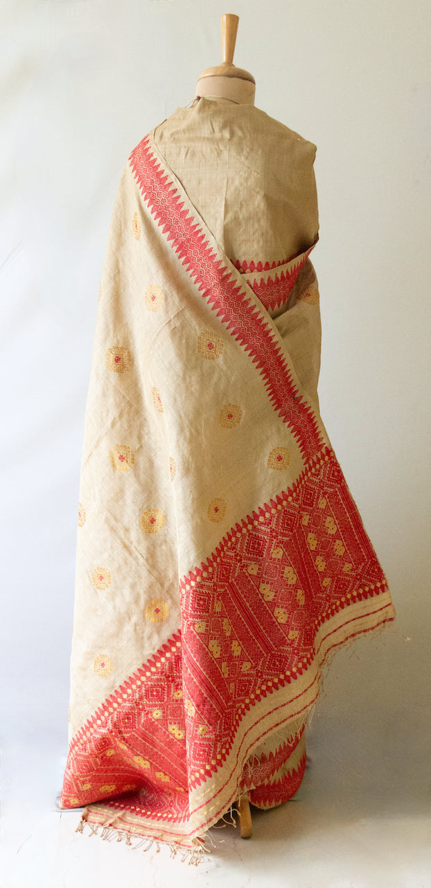 Muga Silk Sari with golden zari and Eri Silk motifs from Assam