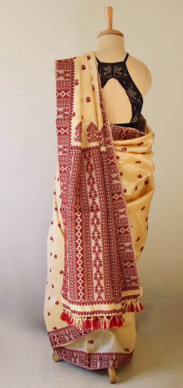 Handloom Tassar Silk Sari with traditional maroon motifs from Assam