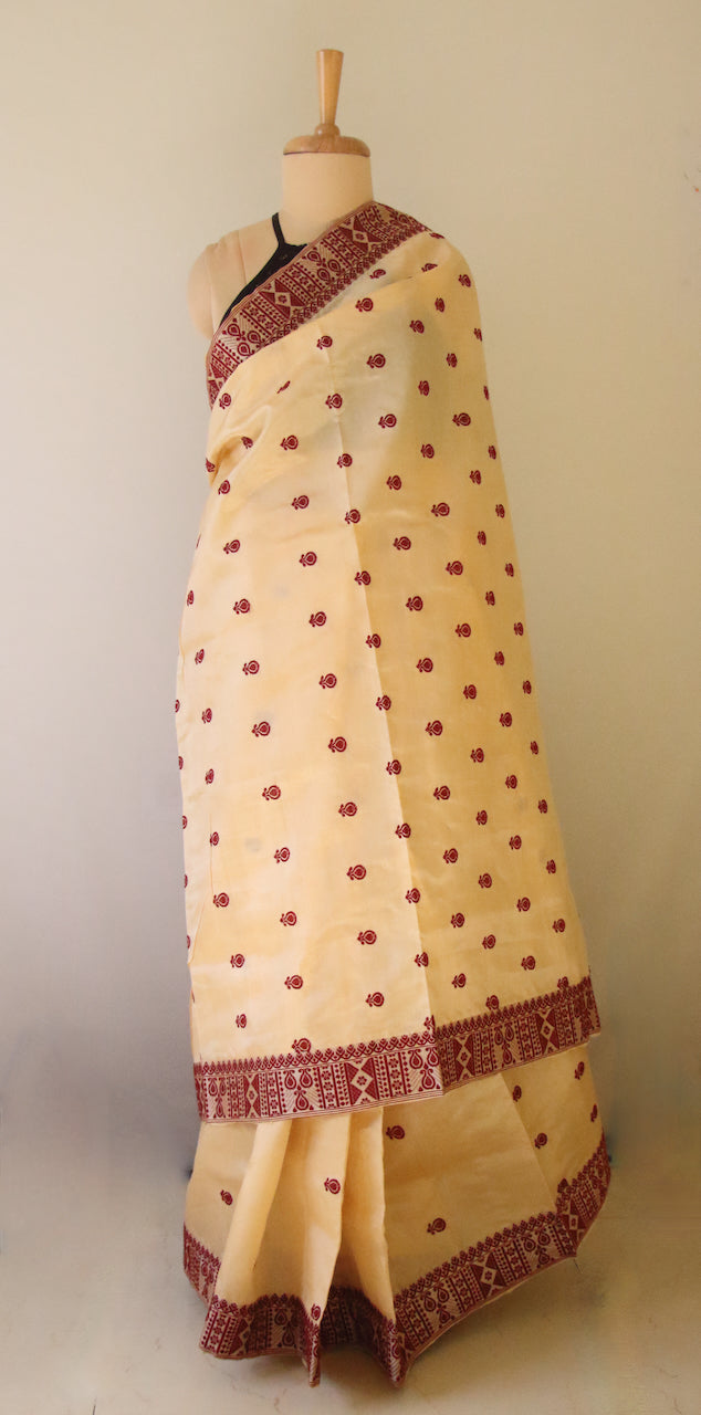 Handloom Tassar Silk Sari with traditional maroon motifs from Assam