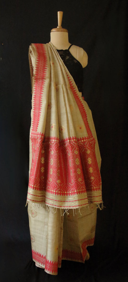 Muga Silk Sari with golden zari and Eri Silk motifs from Assam