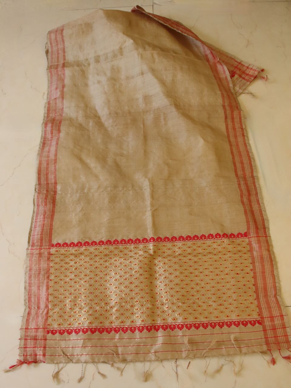 Muga Silk Gamucha with golden zari motifs from Assam