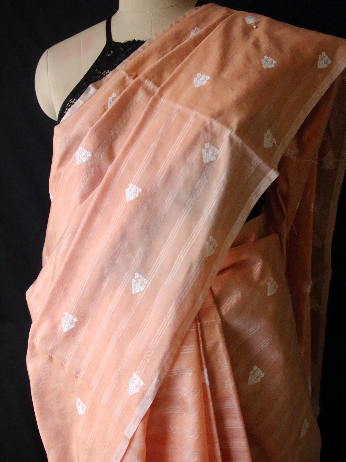 Soft Orange Handloom Silk Saree with chequered effect from Assam