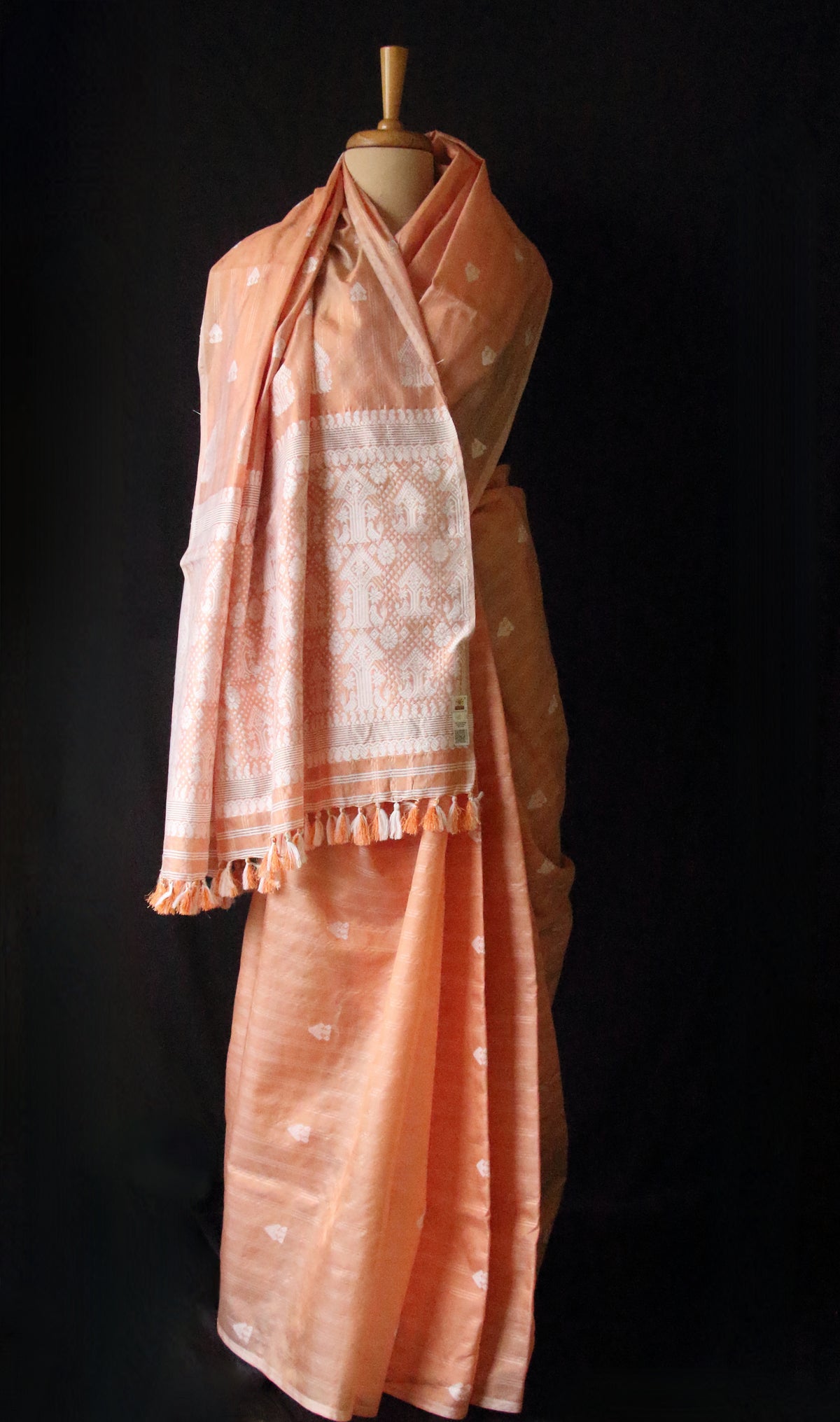 Soft Orange Handloom Silk Saree with chequered effect from Assam