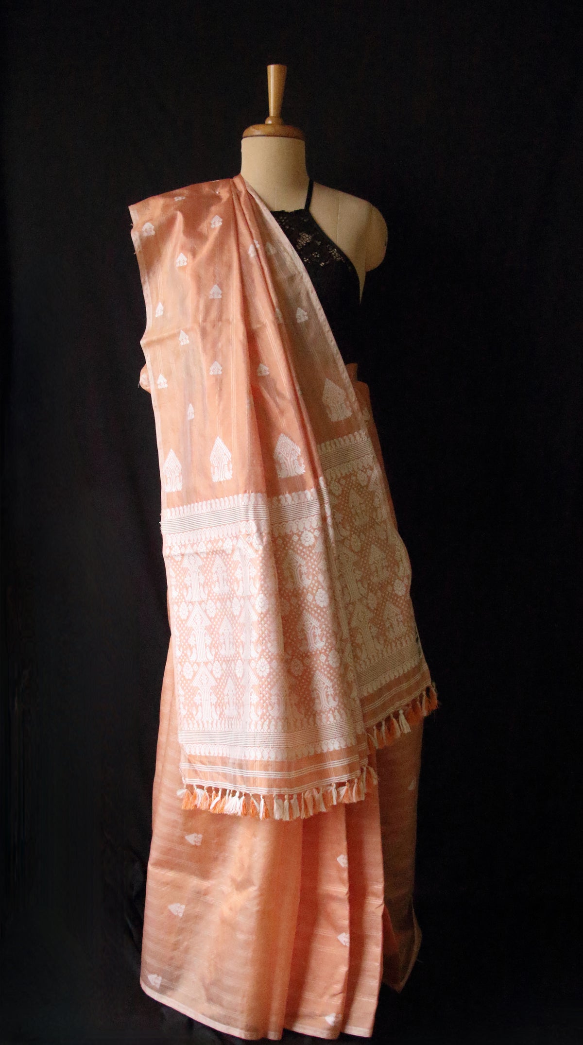 Soft Orange Handloom Silk Saree with chequered effect from Assam