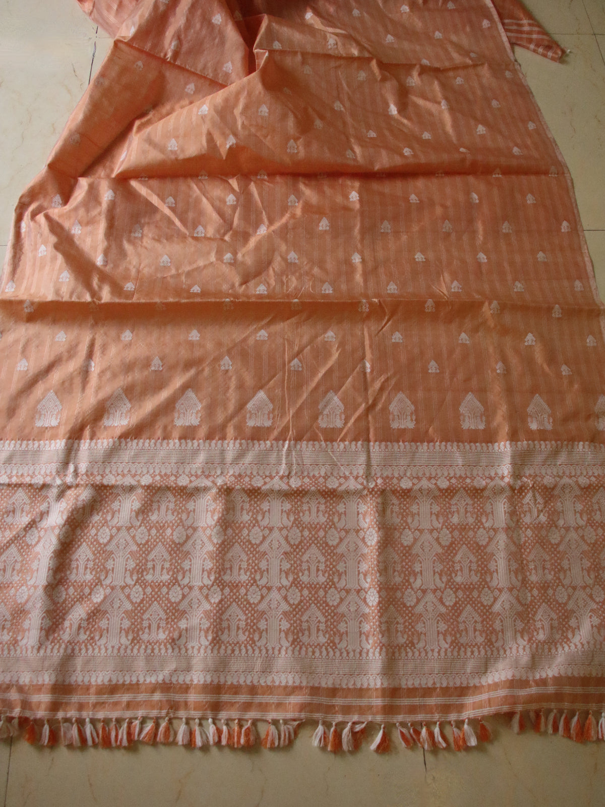 Soft Orange Handloom Silk Saree with chequered effect from Assam