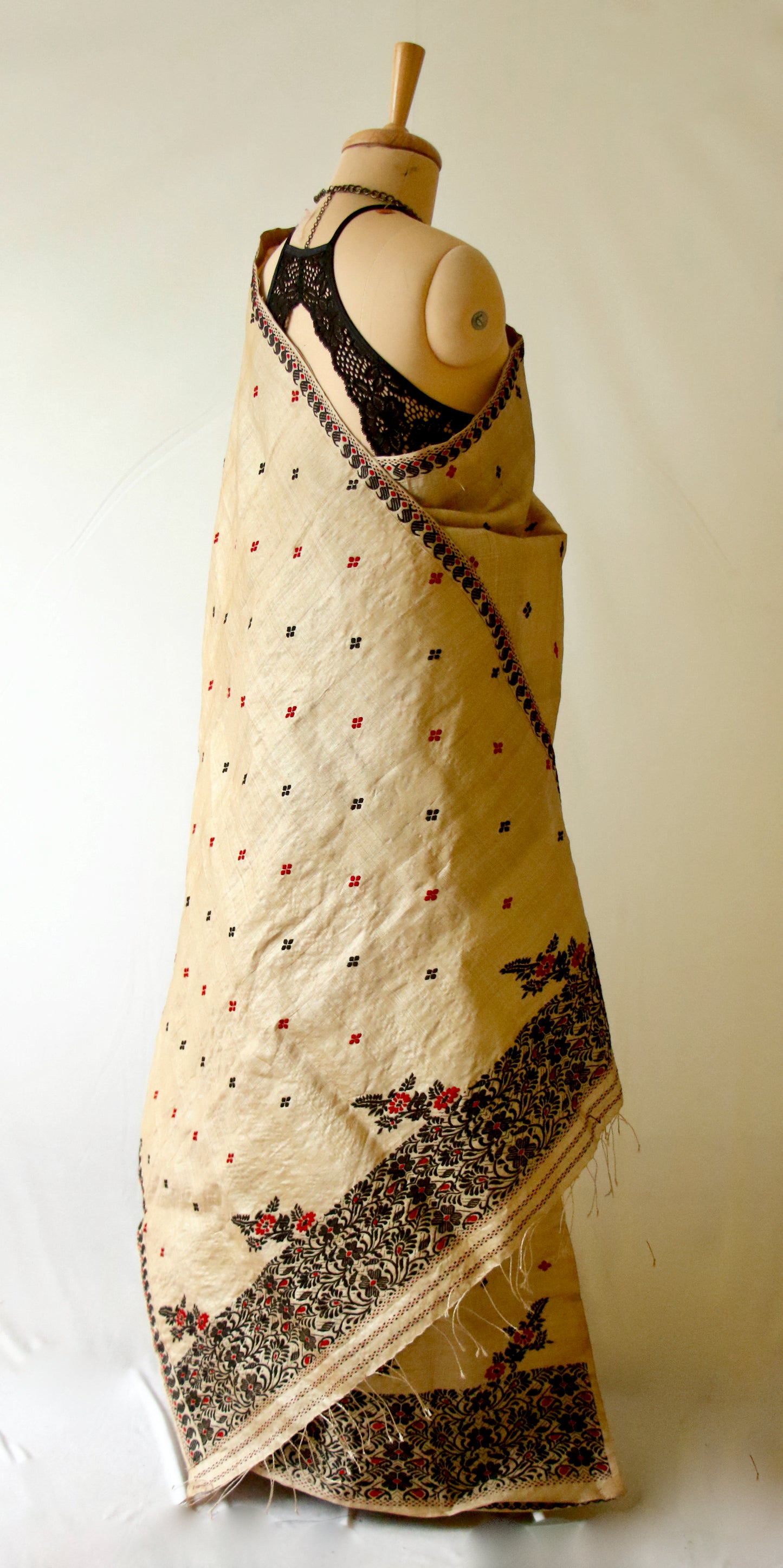 Traditional Classic Muga Silk Mekhla Chador Set with black and red motifs.