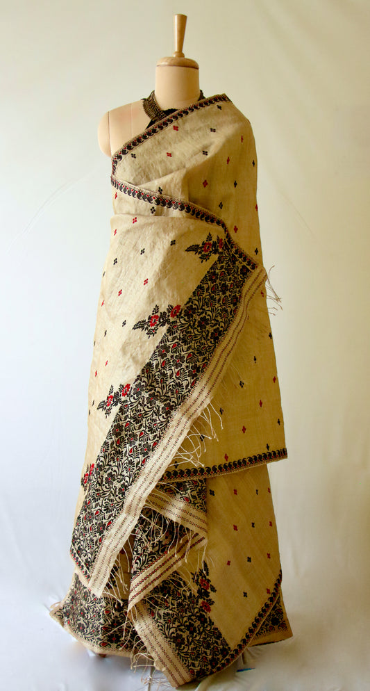 Traditional Classic Muga Silk Mekhla Chador Set with black and red motifs.